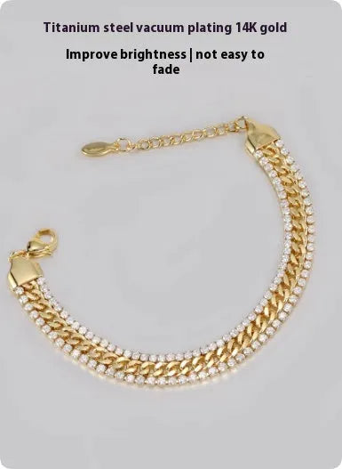 Gold electroplated titanium steel tennis bracelet with artificial gemstones for men and women.