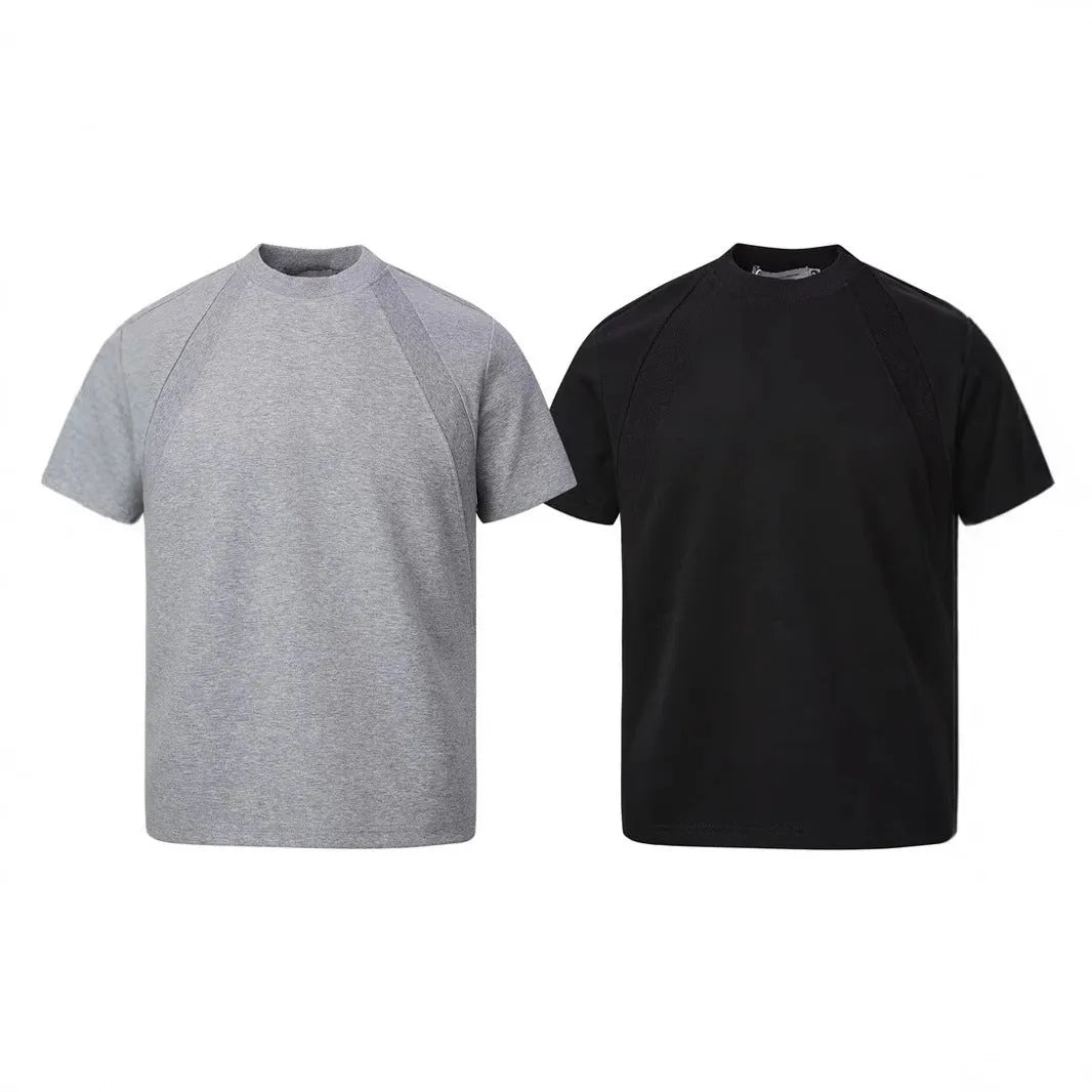 Loose fit short sleeve top with air layer stitching in black, white, or grey.