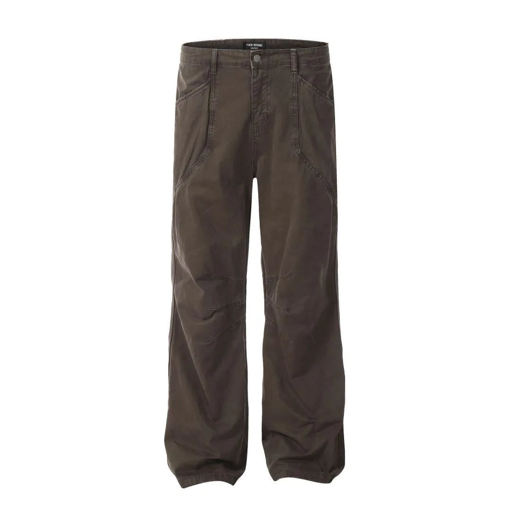 Men's loose straight-leg cotton trousers in brown colour with a high waist and wide leg opening.