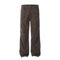 Men's loose straight-leg cotton trousers in brown colour with a high waist and wide leg opening.
