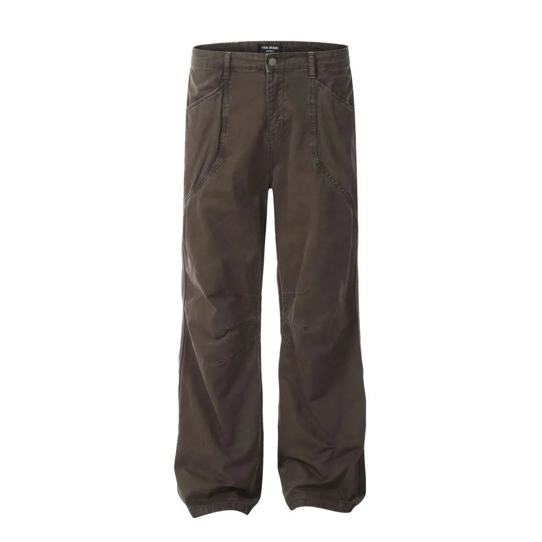 Men's loose straight-leg cotton trousers in brown colour with a high waist and wide leg opening.