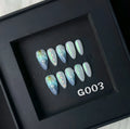 HAILANG blue plastic shell nail sticker set in sizes XS, S, M, L on a white background.