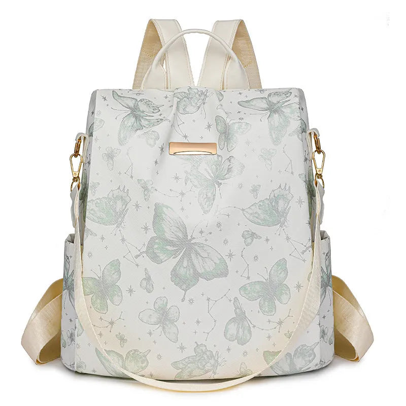 Butterfly printed PU backpack in blue with large capacity shoulder bag design and sewing line detailing
