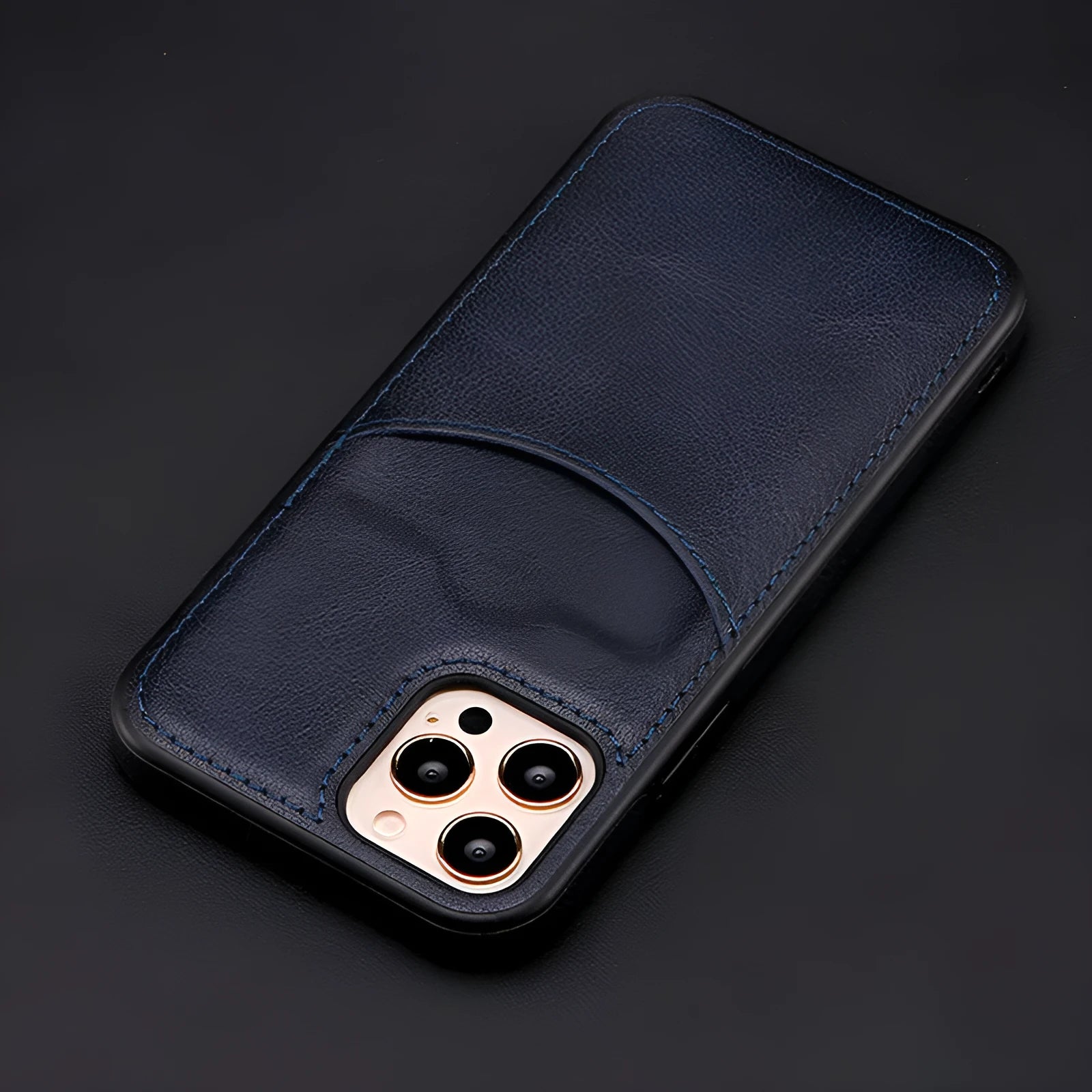 Dark blue PU leather protective case fitted on an iPhone 14 Pro Max smartphone.