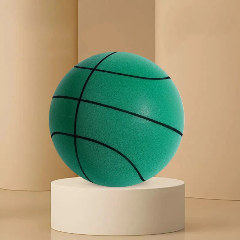 Assorted bright silent foam basketballs in different sizes next to a basketball hoop frame.