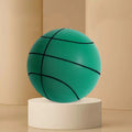 Assorted bright silent foam basketballs in different sizes next to a basketball hoop frame.