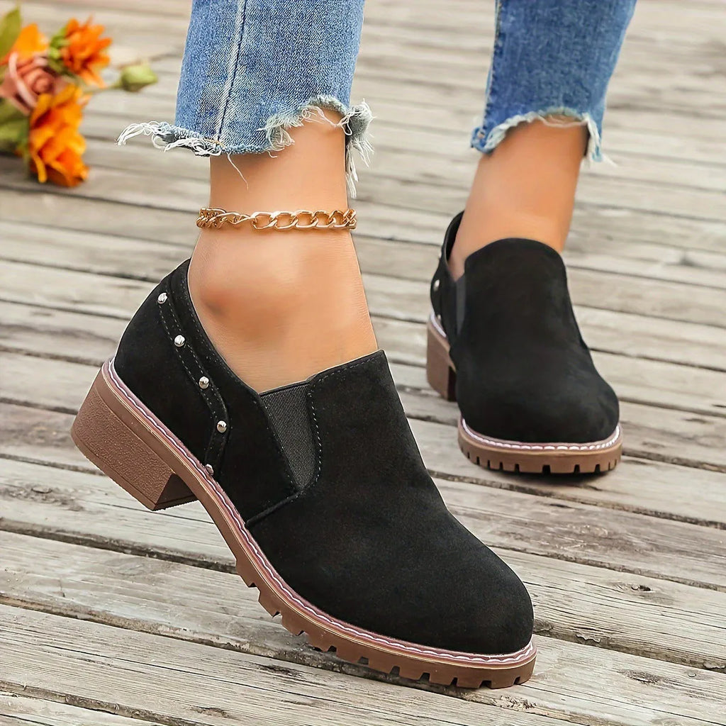 Plus size women's suede ankle boots with low heel, round toe, and elastic band in black