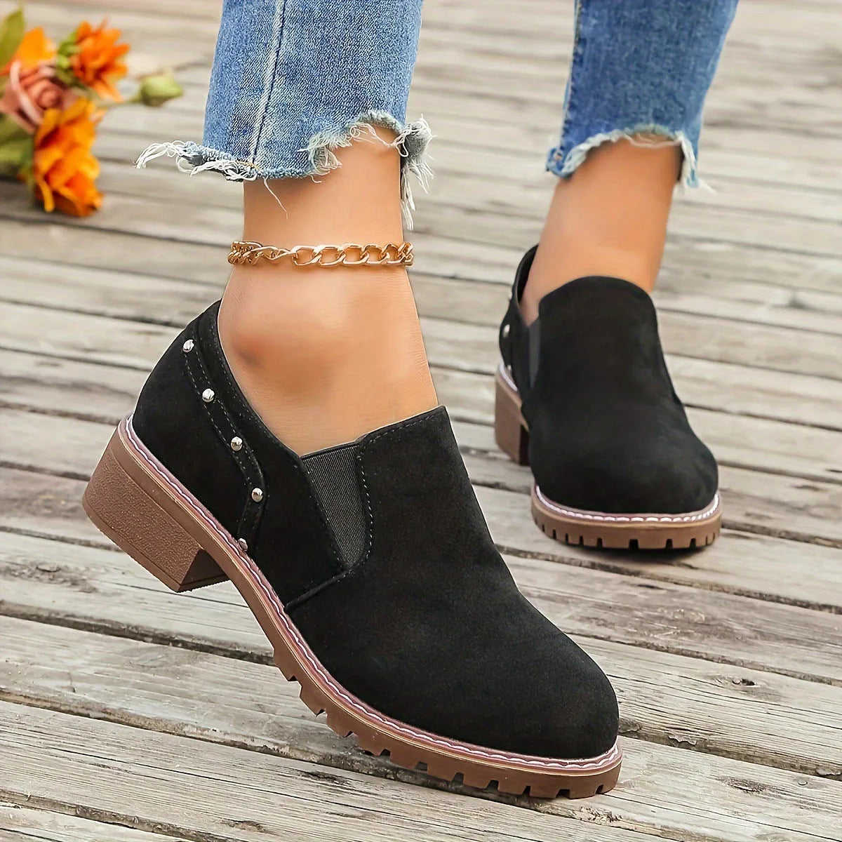Plus size women's suede ankle boots with low heel, round toe, and elastic band in black