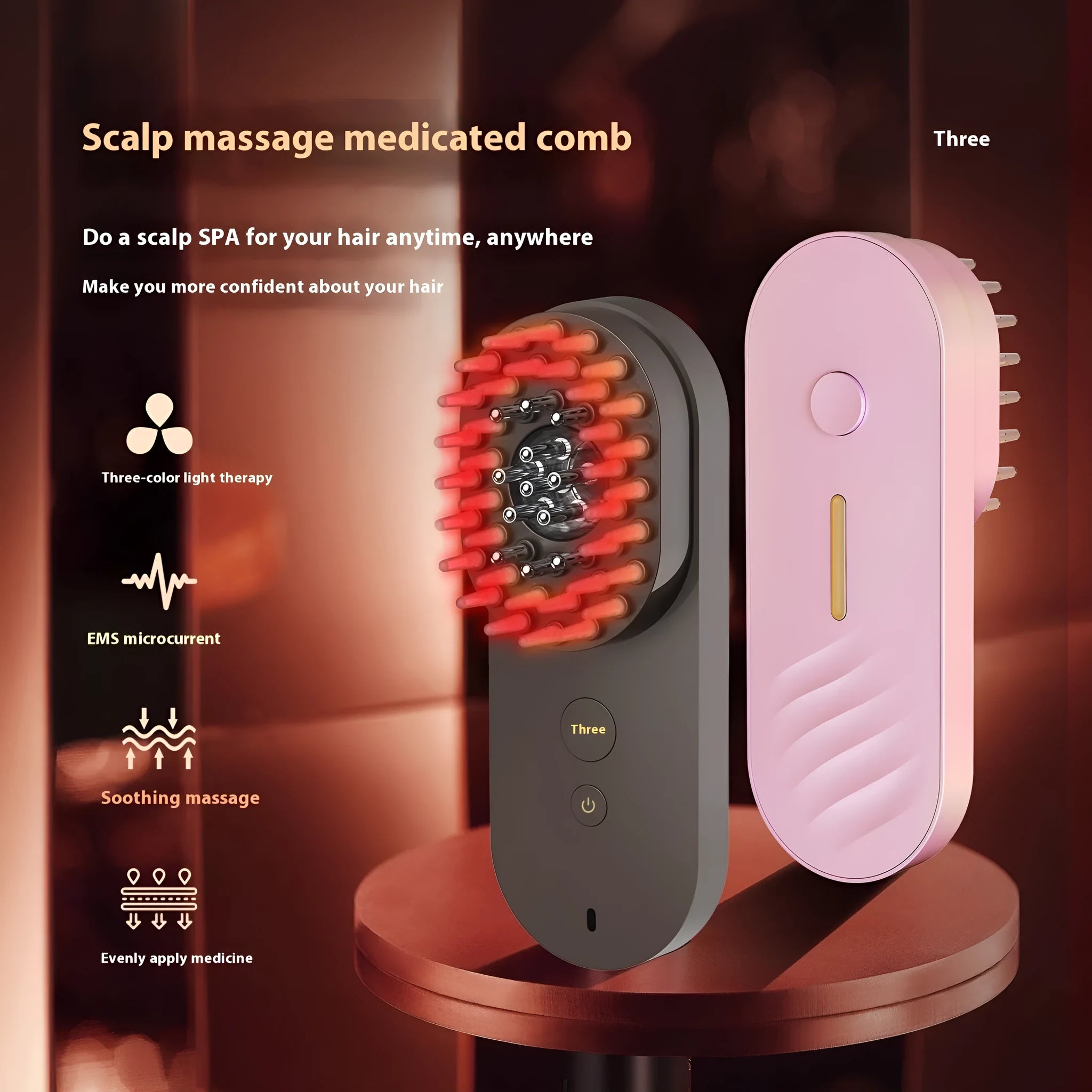 Pink and black smart massage comb with red light therapy for scalp care.