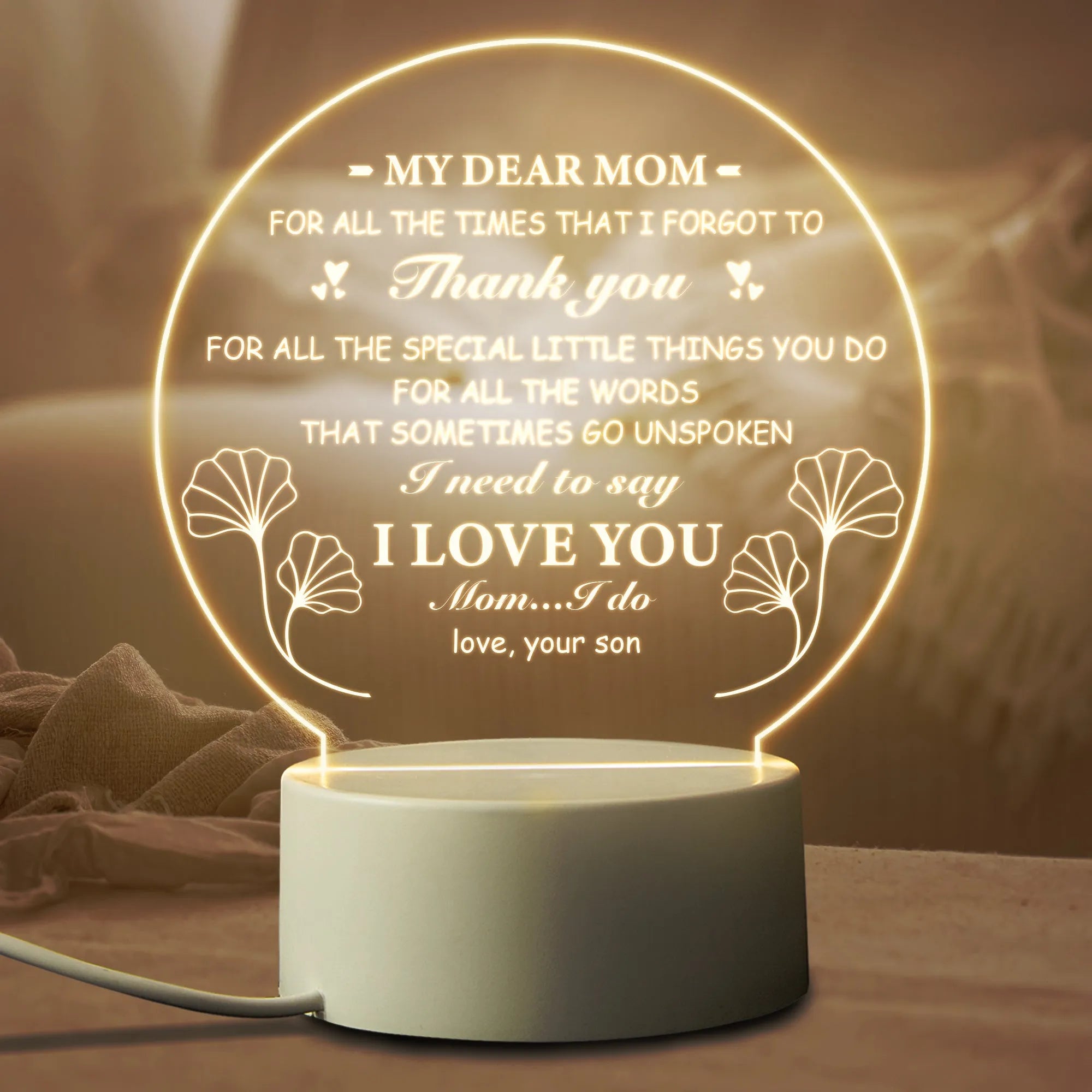 Acrylic LED night light with warm light on white base, USB powered, modern minimalist bedside decoration
