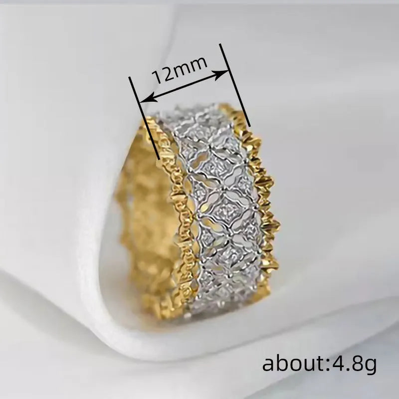 Two-tone gold colour geometric ring with a round zircon stone, showing front detail