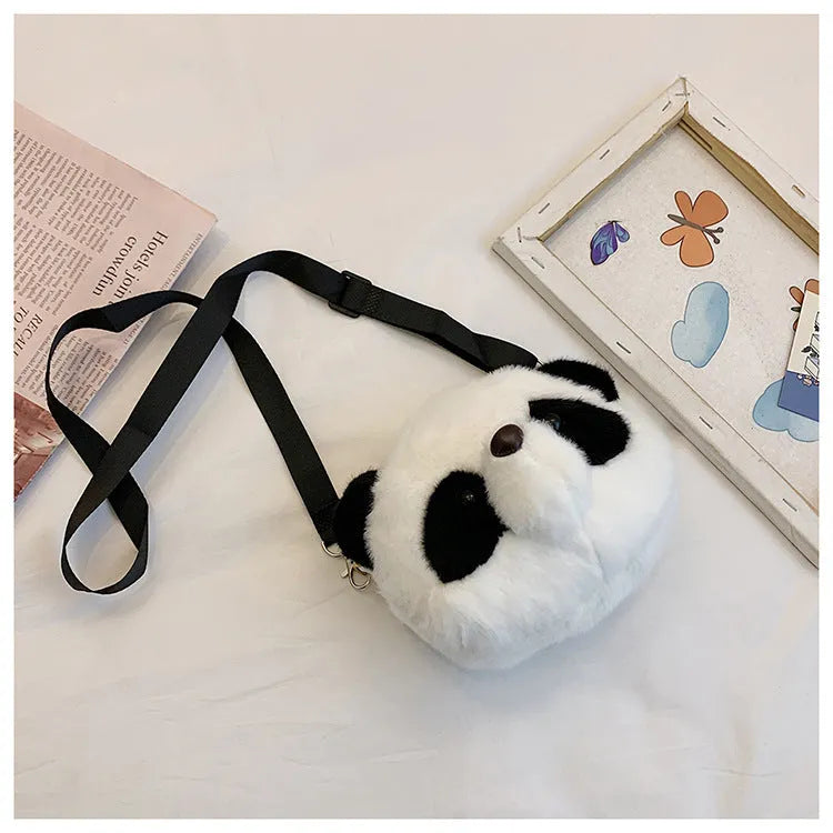 Panda head plush crossbody bag with cylindrical shape and sandwich pocket measuring 18cm