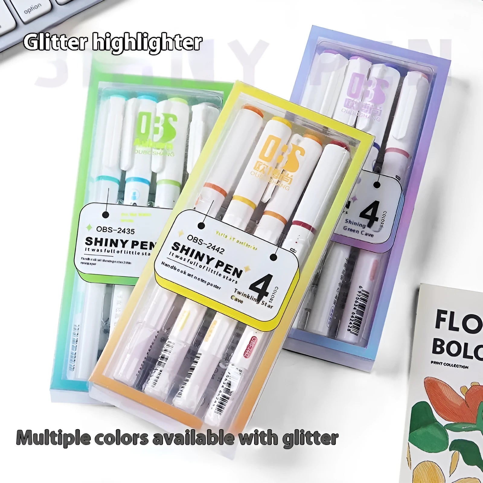 Set of four glitter highlighter pens with star river design and slanted tips in assorted fluorescent colours