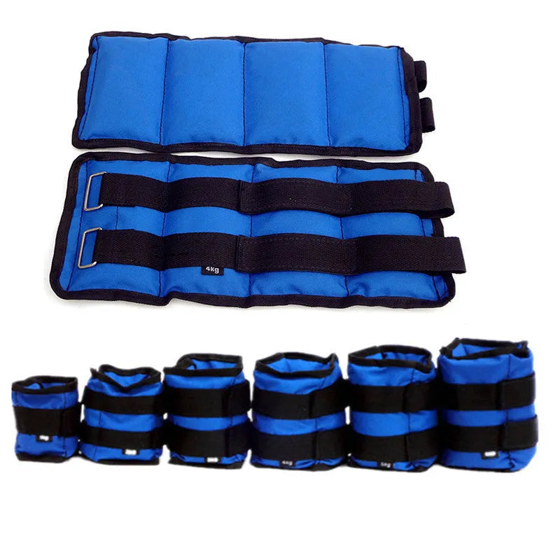 Pair of Oxford cloth legging sandbags for weighted athletic training on a track.