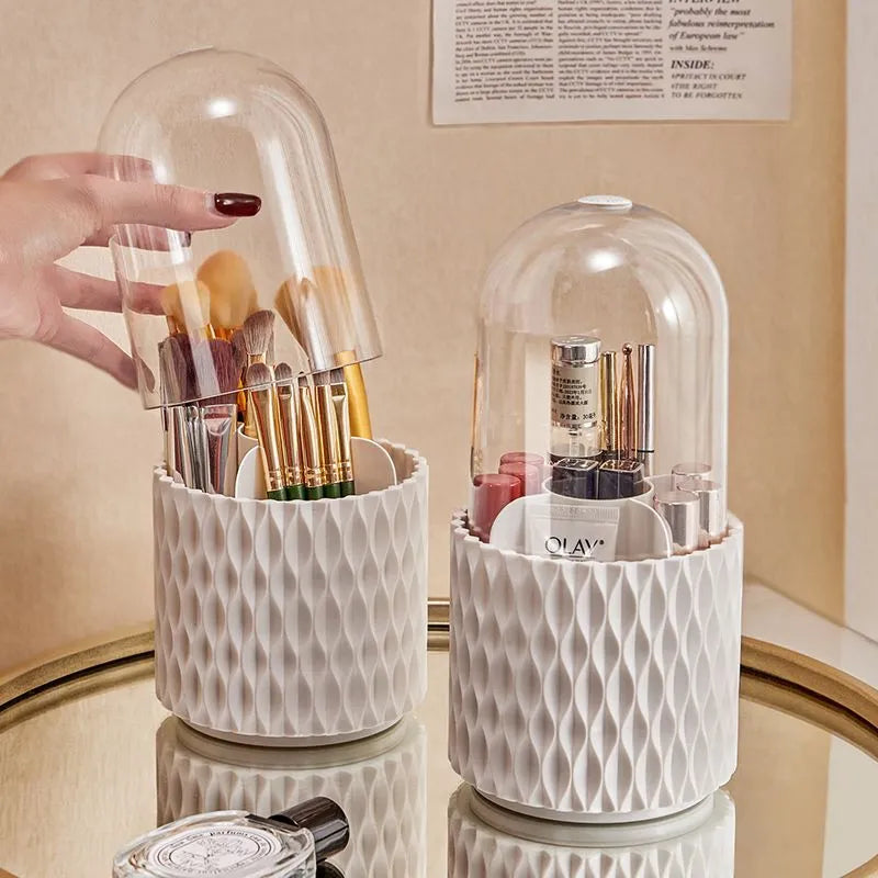 Transparent rotating makeup brush storage box with white accents and removable dust-protecting lid