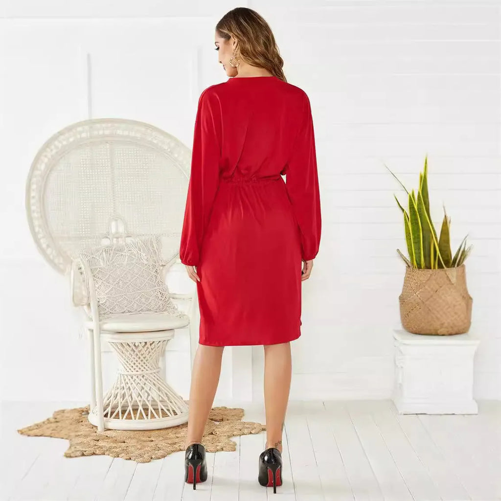 Black polyester A-line midi dress with elastic waist and long sleeves displayed front view