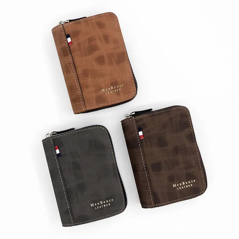 Men's retro short wallet clutch in soft polyurethane leather with letter motif, square vertical shape, available in black and brown colours.