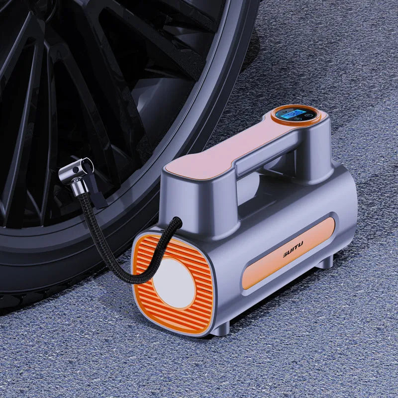 Cordless tyre inflator with digital display, ABS body, and USB charging port on a flat surface