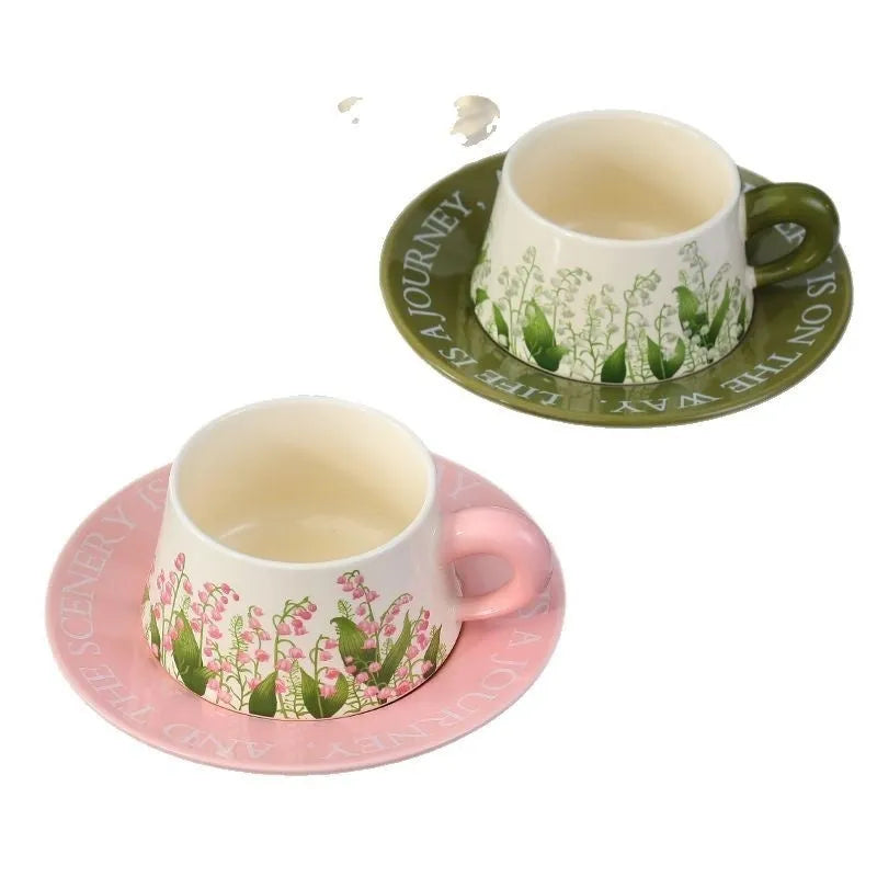 Ceramic coffee cup and saucer set with spoons in hanging bell or Lanling grass couple's cups design.