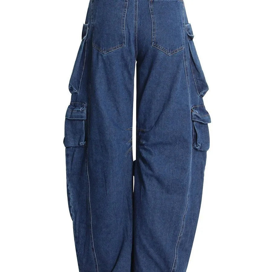 Women's dark blue distressed wide-leg high waist jeans with multiple pockets on a mannequin.