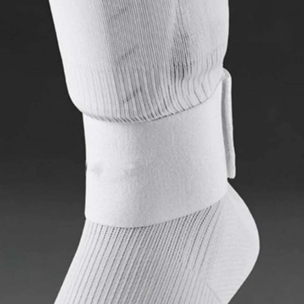 Elastic rubber strap for securing football shin guards, shown in blue colour.