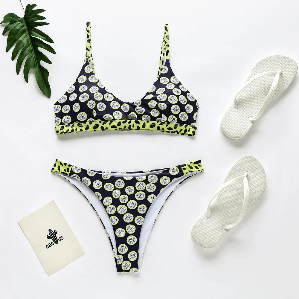 Women's polyester bikini swimsuit in black and white dots or red and white stripes design.
