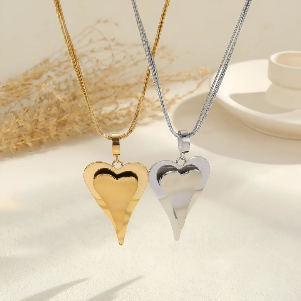 Double heart geometric pendant with snake bones chain design stainless steel necklace for women in gold or steel finish