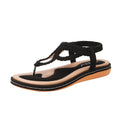 Women's woven flat sandals in solid colour low top with rubber sole, available in black apricot or sapphire blue