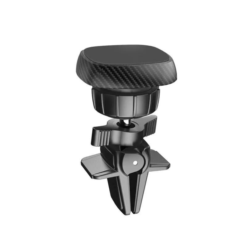 Black magnetic car phone holder mounted on vehicle air vent with mobile phone attached