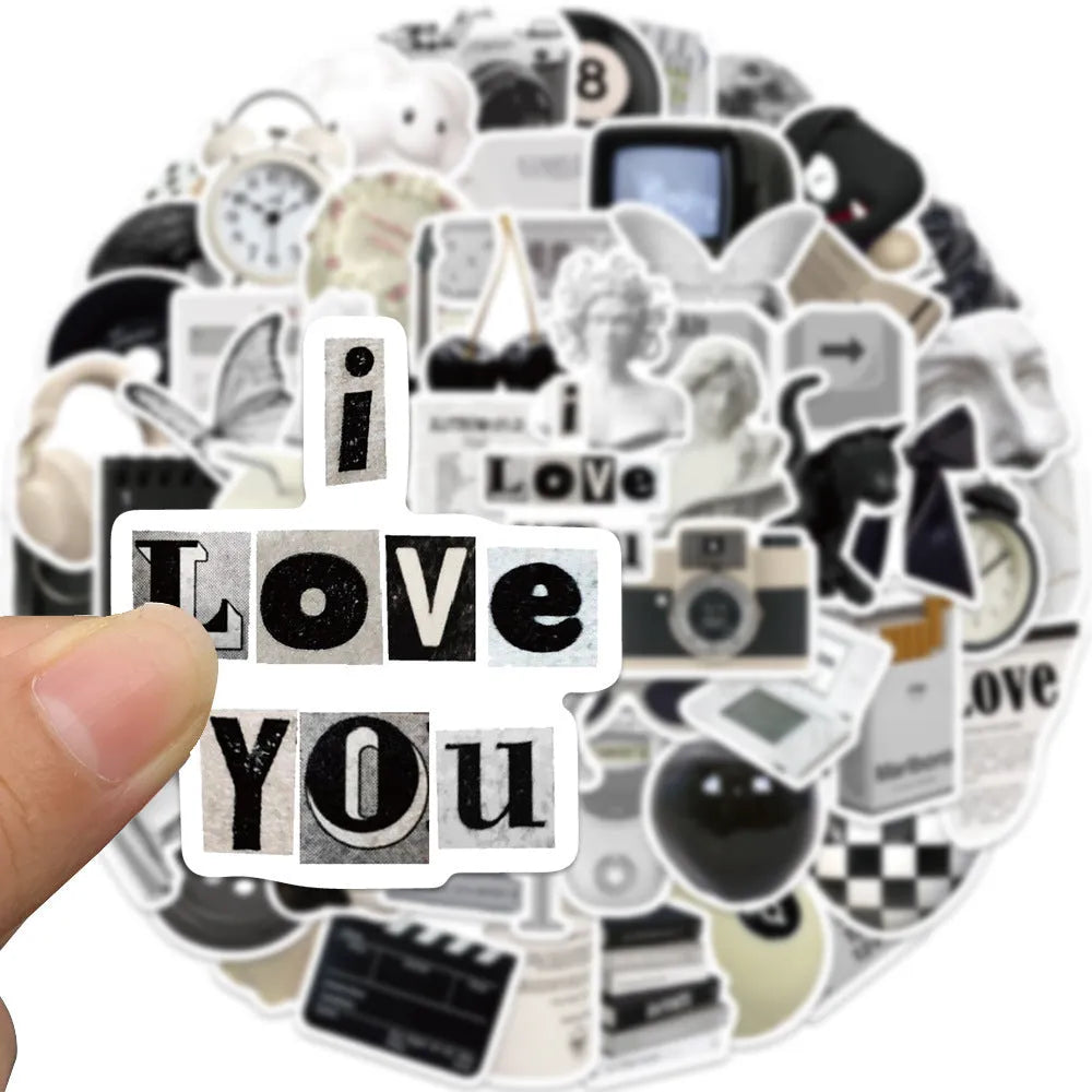 61 black and white waterproof PVC stickers for laptops and phones on a sheet.