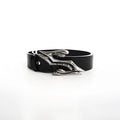 Black men's leather belt with metal letter buckle, showing two-layer cowhide construction.