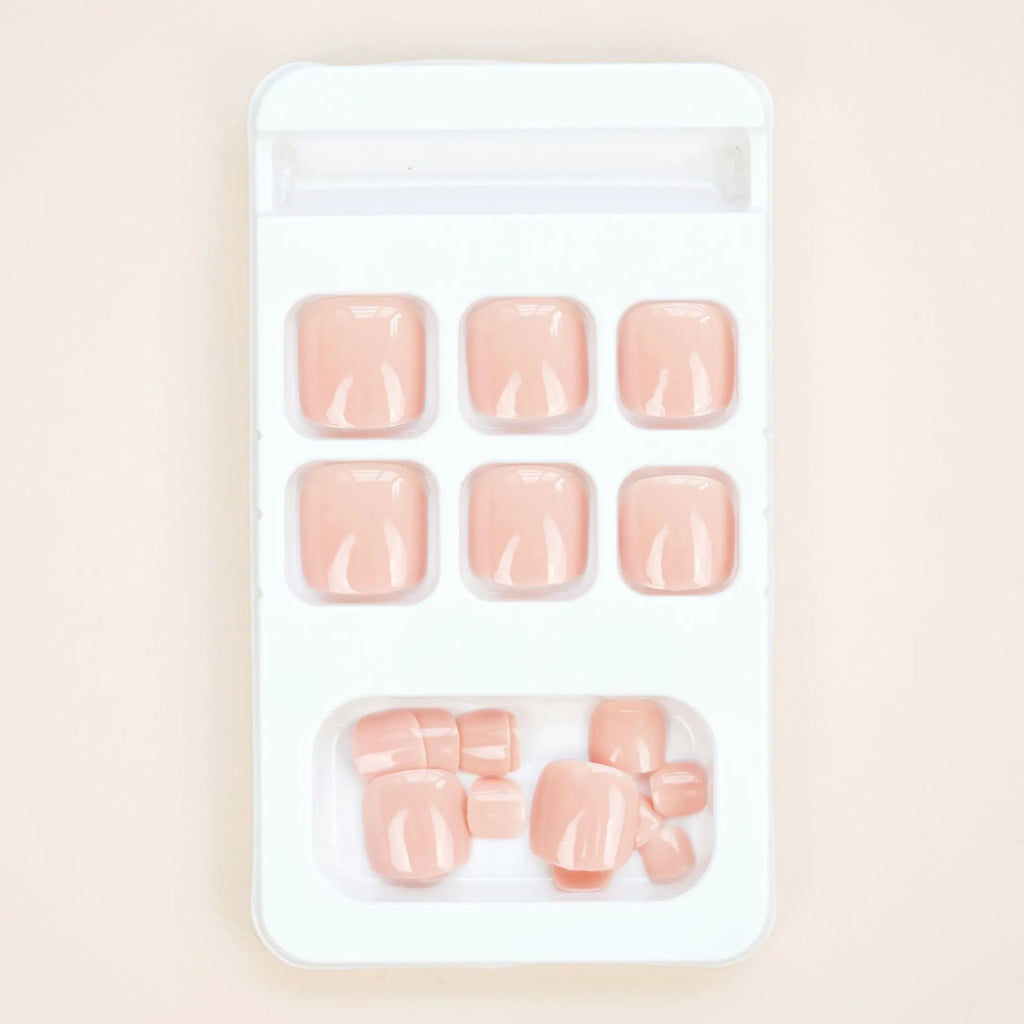 Skin colour plastic toenail stickers with J-52 design and adhesive glue for nail decoration
