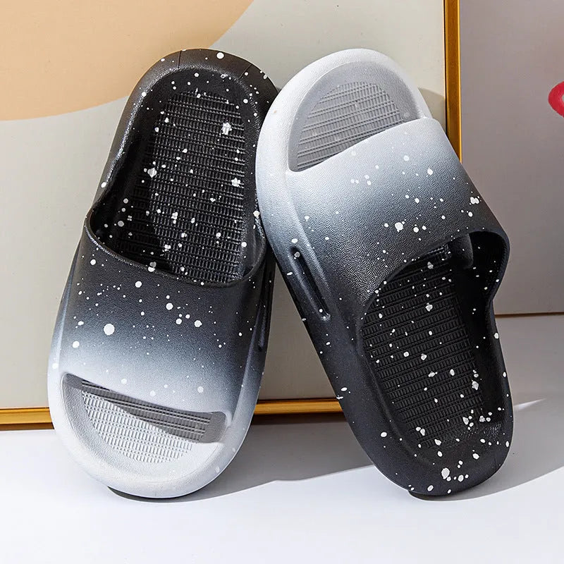 Gradient blue PVC slippers for children on a white background.