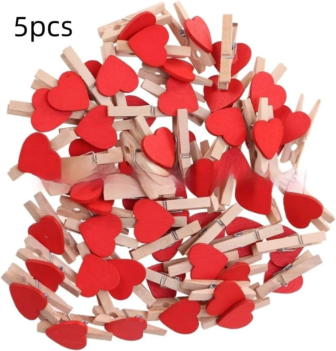 Five handmade solid wood heart-shaped clips in red, pink, white, yellow colours on a wood surface.