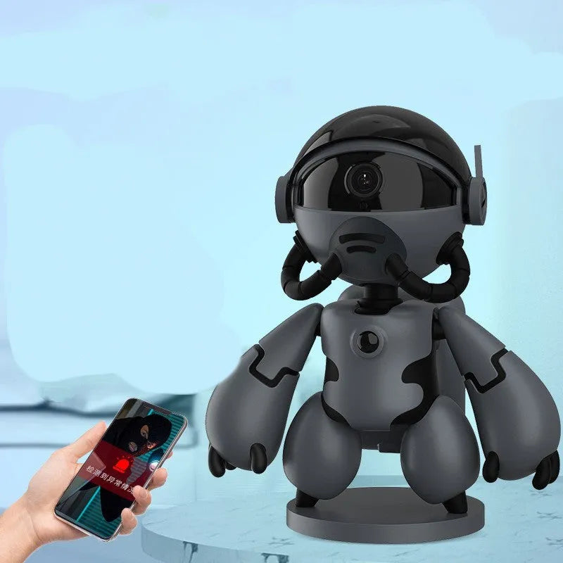 White wireless Space Robot indoor security camera with detachable base on a wooden surface