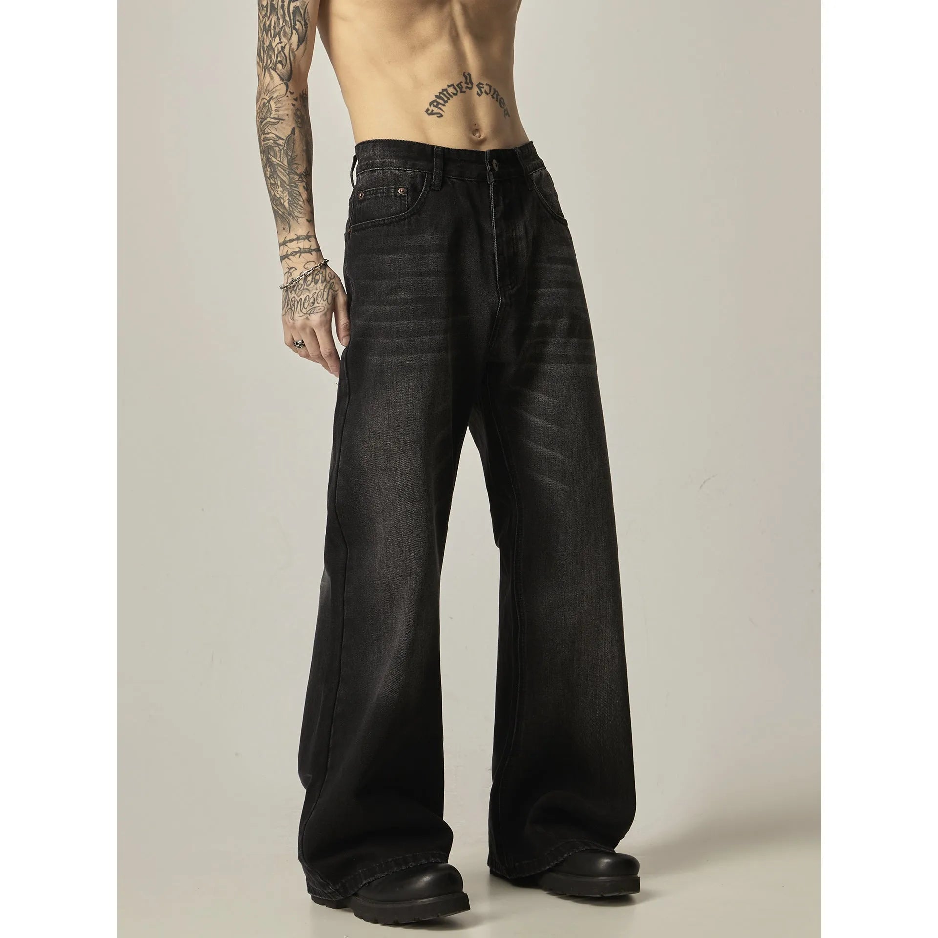 Black straight-leg jeans with American retro styling and zipper fly