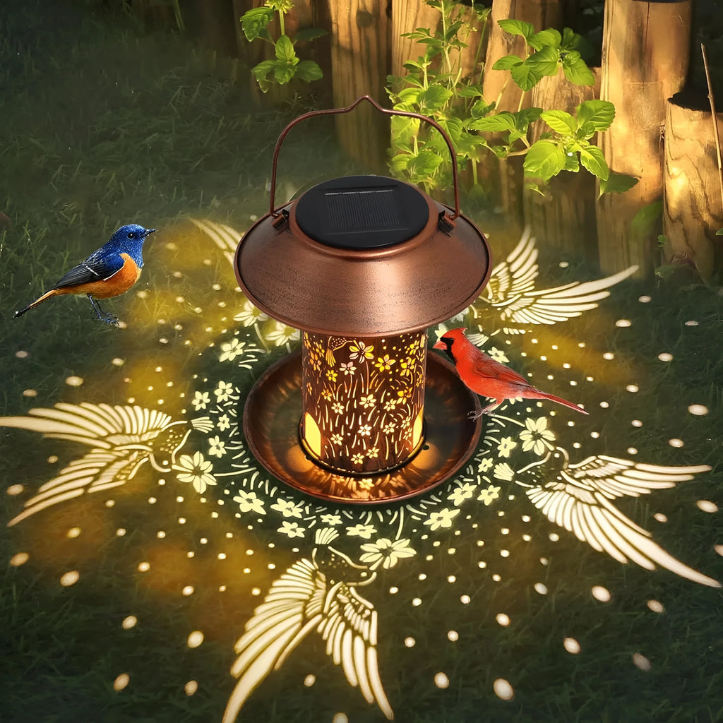 Solar-powered iron bird feeder lamp with hummingbird pattern for outdoor garden lighting and bird feeding