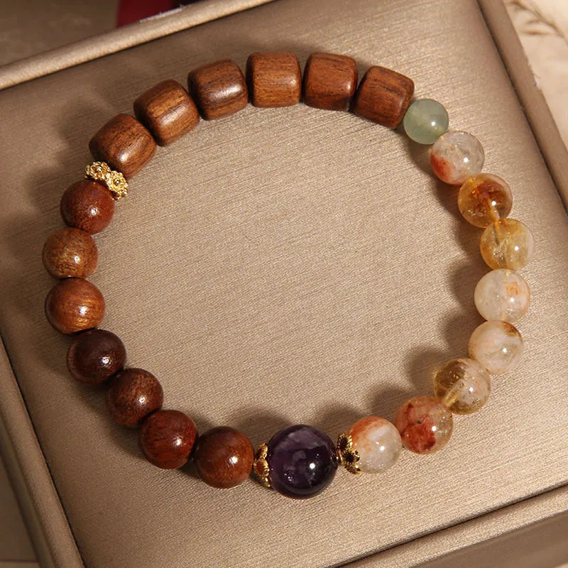 Women's crystal bracelet in yellow tower crystal, ebony, amethyst with pearl and sequin accents