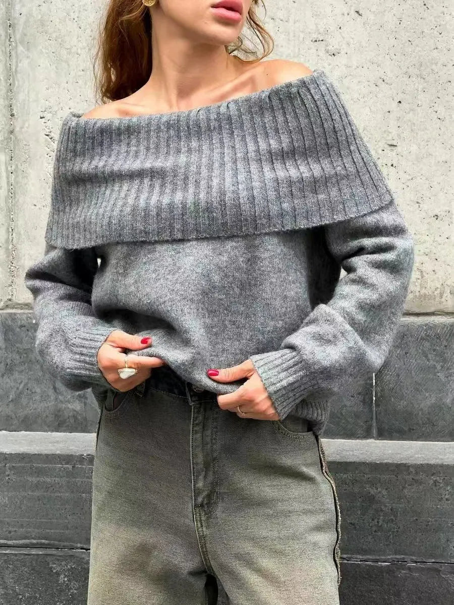 Grey off-the-shoulder strapless sweater with a 3D pattern, shown as a pullover.