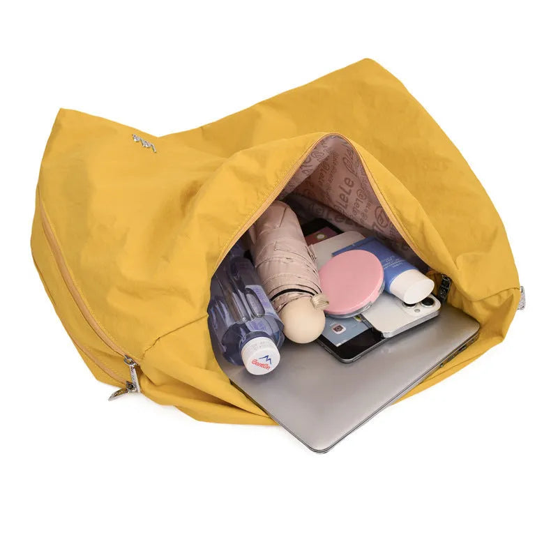 Women's heart-shaped nylon underarm bag in black, yellow, khaki and blue colour options