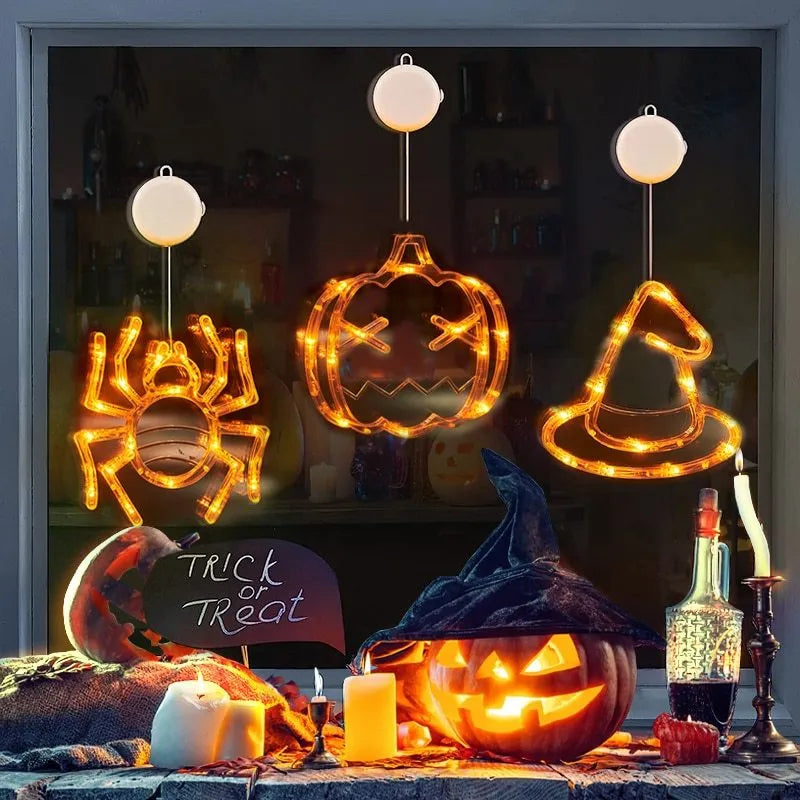 Set of seven Halloween LED hanging lights with spider, pumpkin, and ghost designs for window decoration