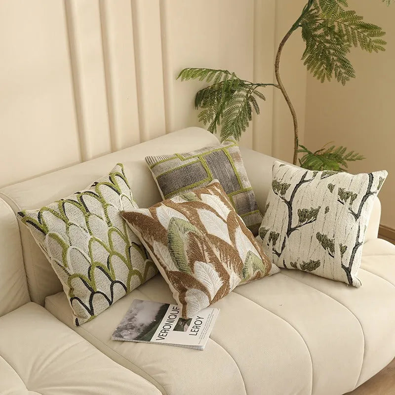 Square Jacquard floral cushion cover in a choice of colours, showing textured plants and flowers pattern.