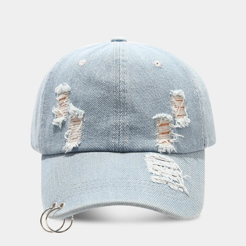 Men's adjustable denim peaked cap with dome crown in light blue jeans colour on a plain background