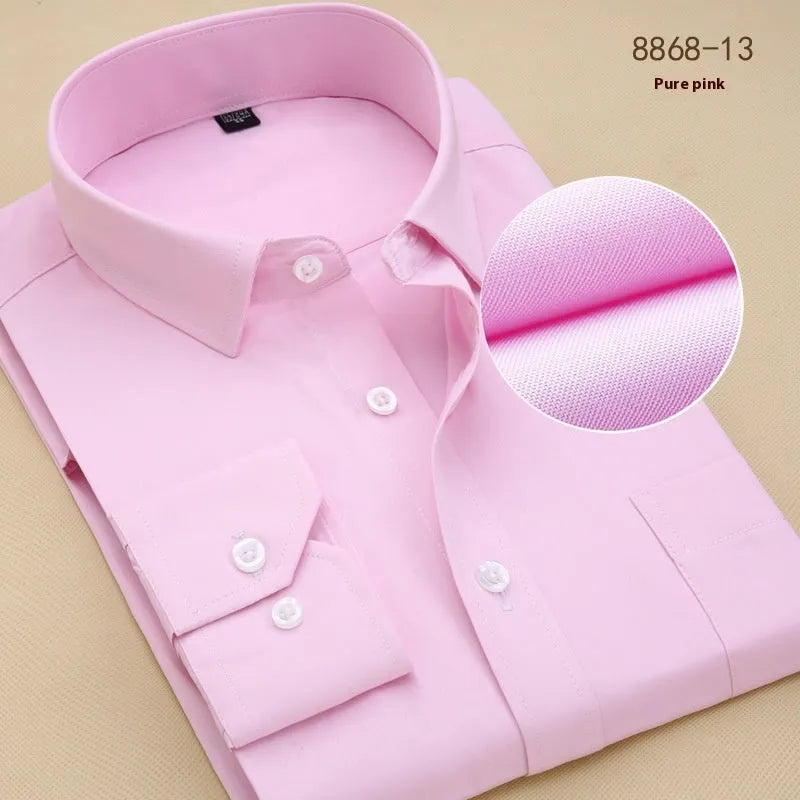 Men's black slim fit long sleeve business shirt made from cotton fabric on a hanger.