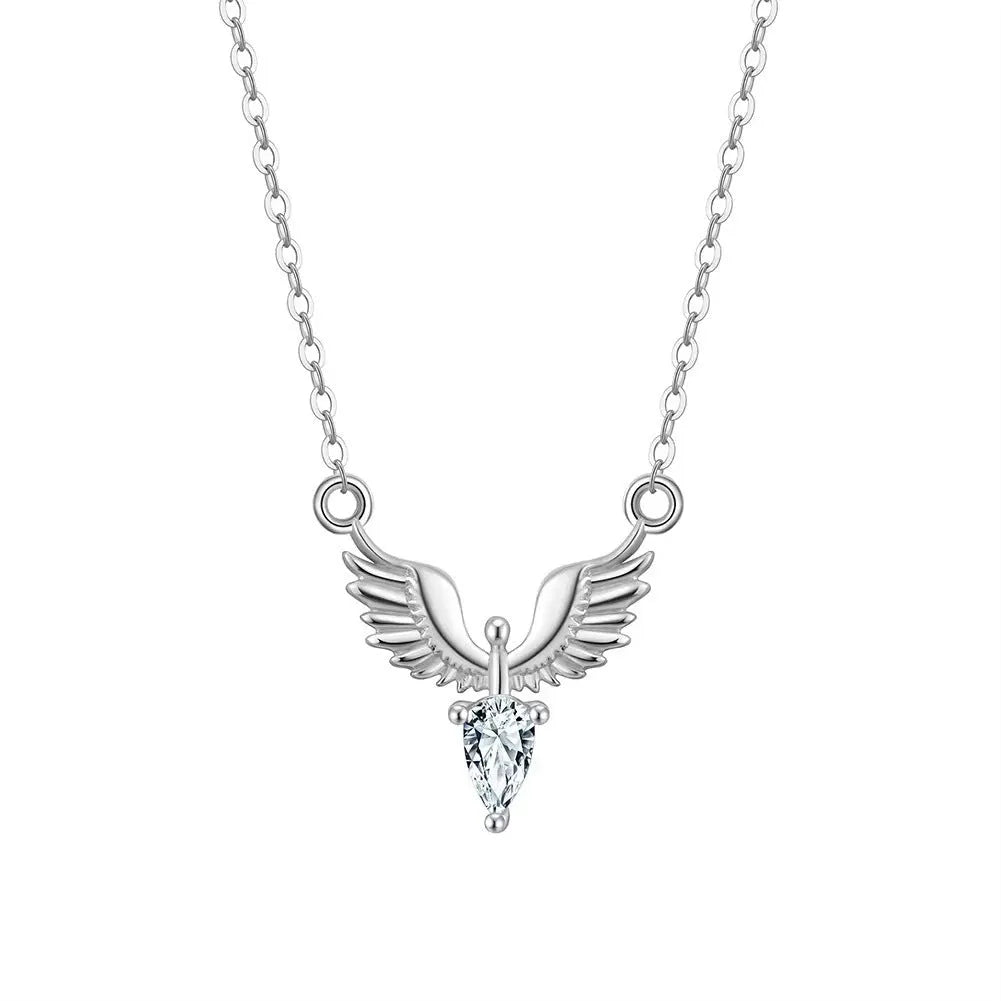 Close-up of a women's sterling silver necklace with an eagle pendant on an O-ring chain.