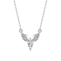 Close-up of a women's sterling silver necklace with an eagle pendant on an O-ring chain.