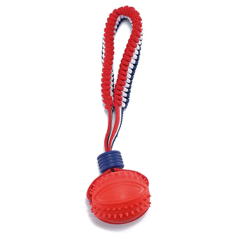 Blue natural rubber dog ball with rope attached, measuring 6.5cm in diameter