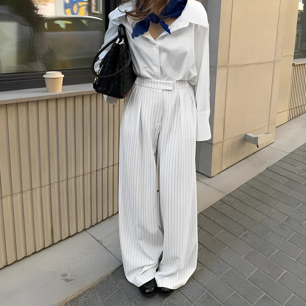 White striped wide-leg trousers with front zip fastening and loose casual cut for commuting
