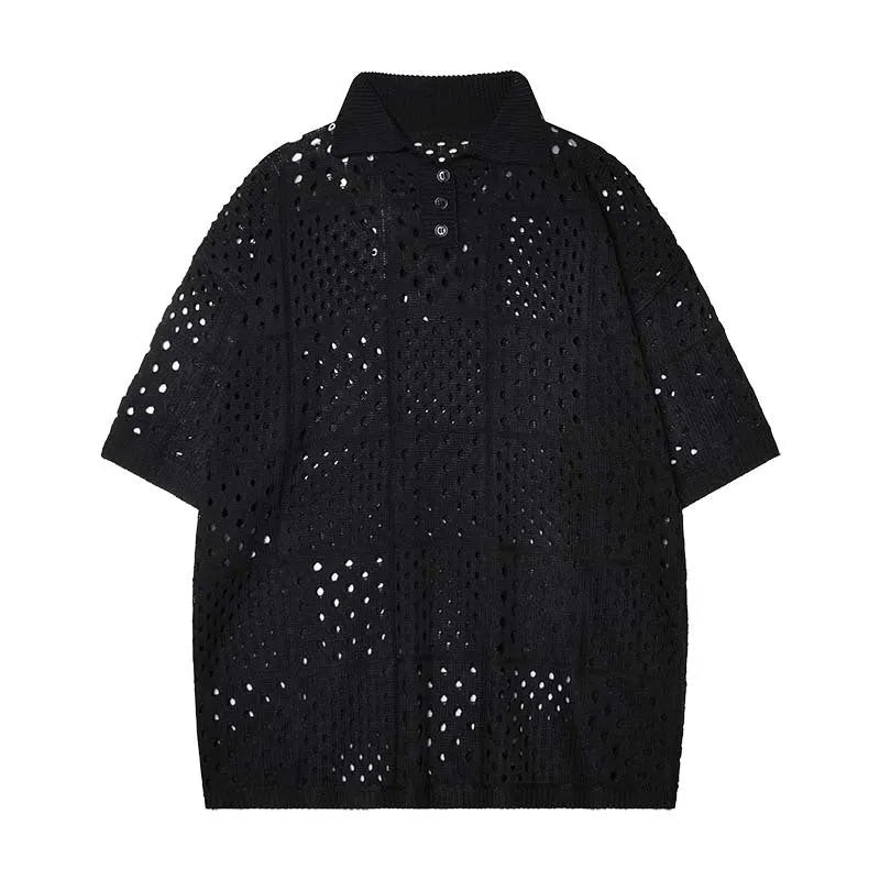 Man wearing a black loose-fit knitted short-sleeve polo shirt with a collar and button placket.