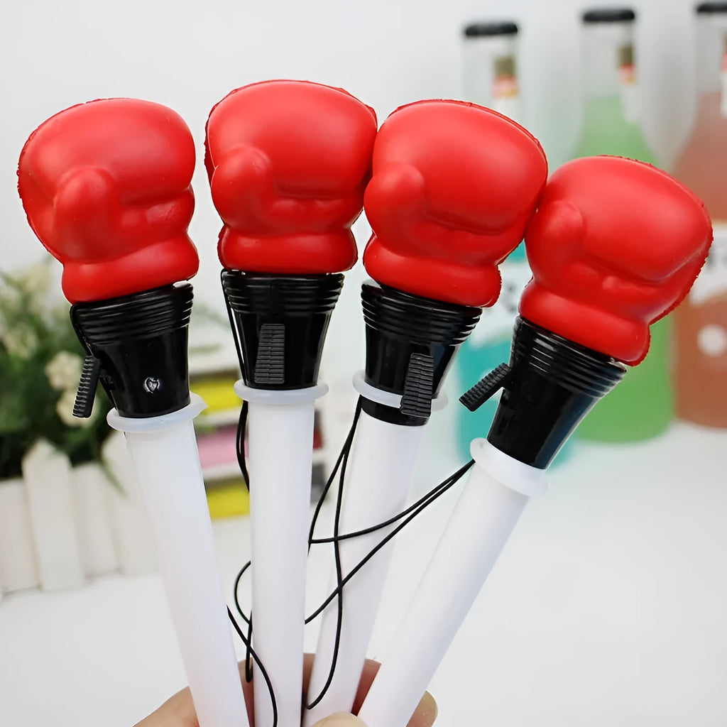 Four black-ink gel pens with pressure-relief ejection mechanisms and 0.7 mm bullet tips